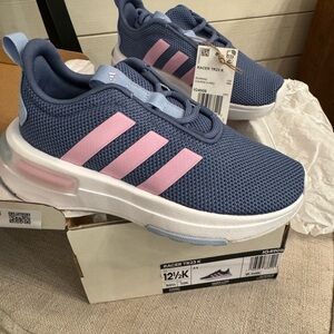 New youth Adidas tie sneakers in size 12.5 with tags.
